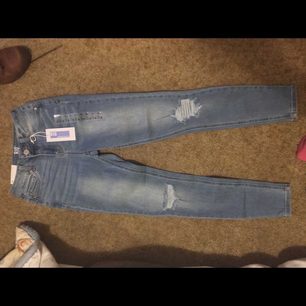 Distressed push up light wash jegging size 0